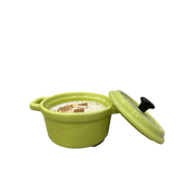 Candela Cocotte Verde in cera di soia e olio di cocco, con puro olio essenziale di Palo Santo